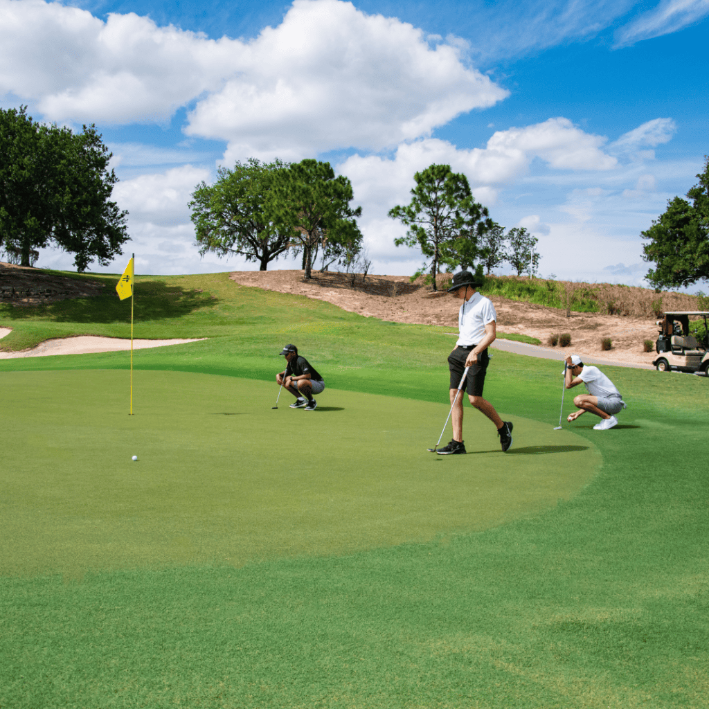 students of our junior golf program on the green on a sunny day